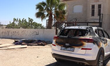 Israeli settlers set fire to homes and vehicles in an attack Palestinian officials say killed three people.