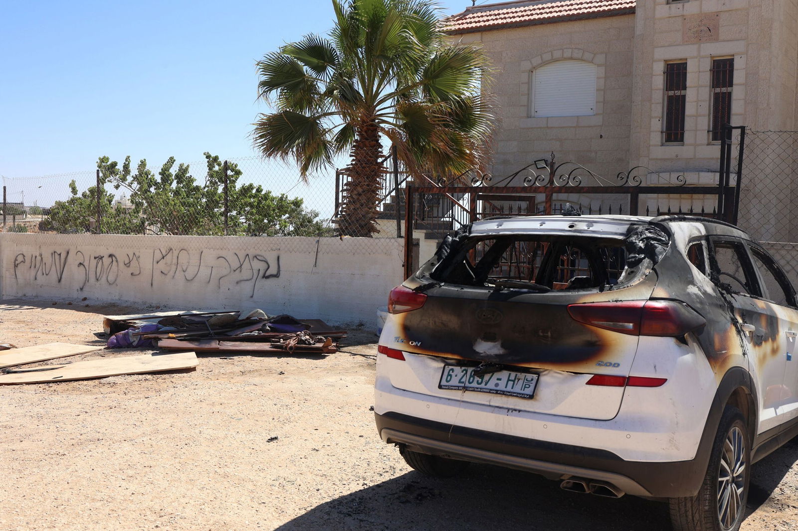 <i>Zain Jaafar/AFP/Getty Images via CNN Newsource</i><br/>Israeli settlers set fire to homes and vehicles in an attack Palestinian officials say killed three people.
