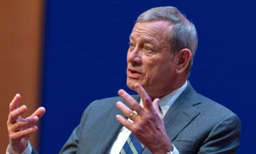 Chief Justice of the Supreme Court John Roberts speaks during a lecture to the Georgetown Law School graduating class of 2025
