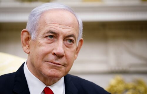 Israeli Prime Minister Benjamin Netanyahu attends a meeting with US President Donald Trump in the Oval Office of the White House in Washington