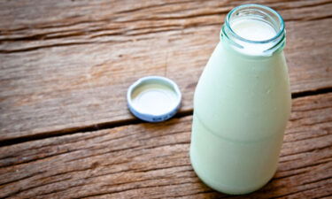 Fresh Milk on Glasses Bottle