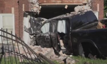 Four people were taken to the hospital after a pickup truck rammed into a brick apartment building in the Woodlawn neighborhood Saturday morning.