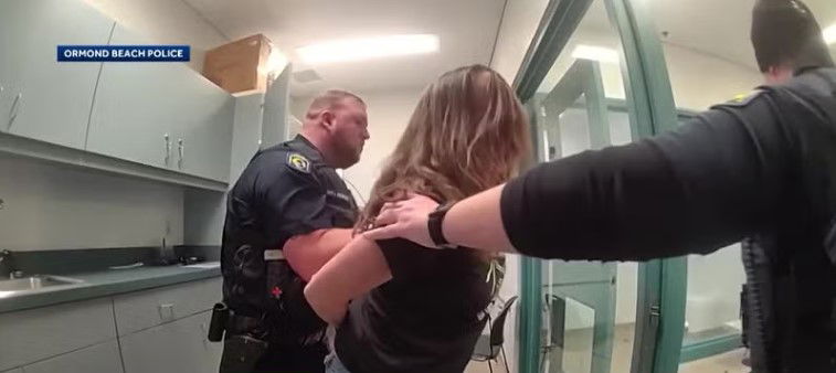 <i>Ormond Beach Police/WESH via CNN Newsource</i><br/>Newly released body camera footage shows the moment a now-former Ormond Beach police officer violently threw a handcuffed woman to the ground during a DUI arrest