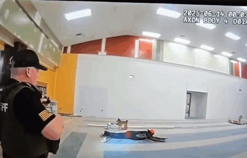 Newly released police bodycam shows a man being arrested after authorities say he broke into a Georgia school overnight.