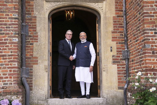 Britain's Prime Minister Keir Starmer welcomes Indian Prime Minister Narendra Modi at Chequers near Aylesbury