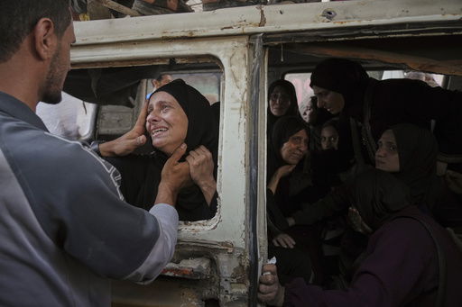 Palestinians mourn their relatives killed from an Israeli army bombardment of Gaza