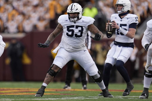FILE - Penn State offensive lineman Nick Dawkins (53) in action during the first half of an NCAA college football game against Minnesota