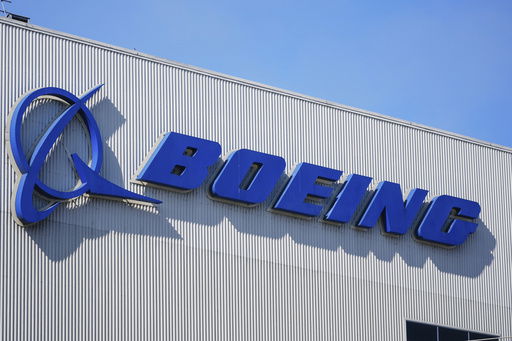FILE - The Boeing logo is displayed at the company's factory
