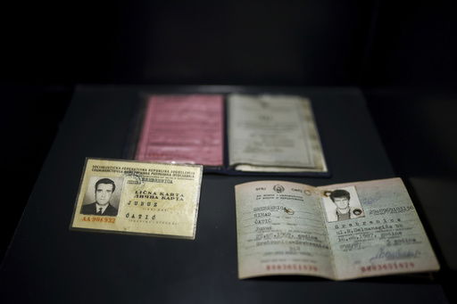 Personal documents found in a mass grave are shown as a part of the exhibition