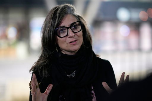 U.N. Special Rapporteur for the Occupied Palestinian Territories Francesca Albanese talks to The Associated Press at the Sarajevo airport in Sarajevo