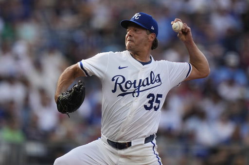 Kansas City Royals starting pitcher Rich Hill throws during the first inning of a baseball game against the Atlanta Braves
