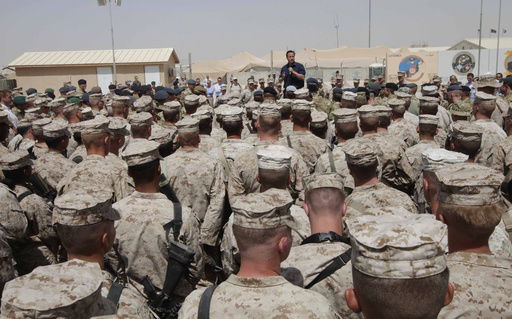 FILE - Britain's Prime Minister David Cameron delivers a speech to British and US troops during a visit to Camp Bastion
