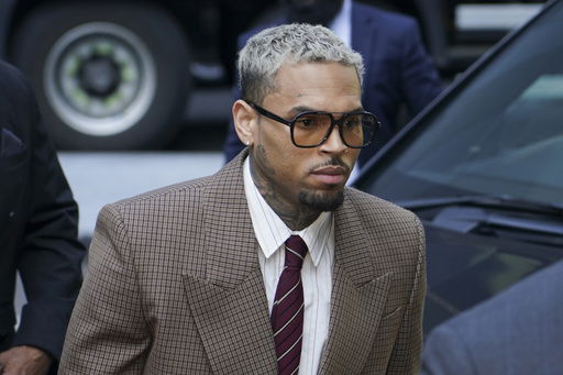 Grammy-winning singer Chris Brown makes his way into Southwark Crown Court