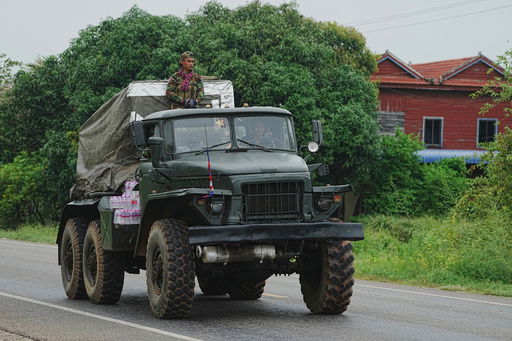 A Cambodian military vehicle carries rocket launcher in Oddar Meanchey province