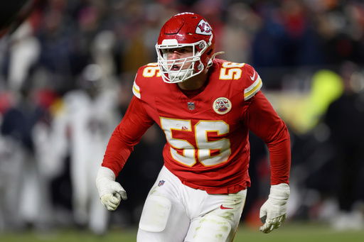 FILE - Kansas City Chiefs defensive end George Karlaftis celebrates a sack against the Houston Texans during the second half of an NFL football divisional playoff game