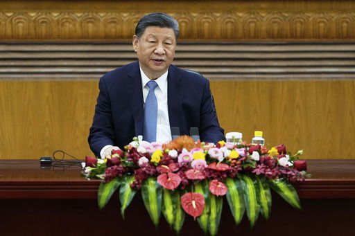 FILE - Chinese President Xi Jinping attends an event at the Great Hall of the People in Beijing on March 28