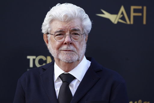 FILE - George Lucas arrives for the 50th AFI Life Achievement Award tribute to Francis Ford Coppola on Saturday