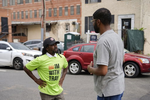 Former District of Columbia Councilman Trayon White talks to a voter outside Union Temple Baptist Church during the Ward 8 special election