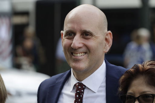 FILE - New York State Assemblyman Harvey Epstein campaigns in New York on Aug. 16