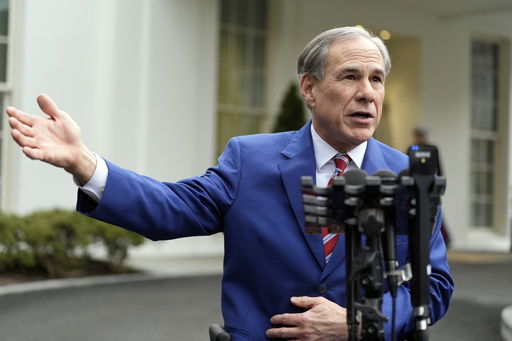 FILE - Texas Gov. Greg Abbott speaks to reporters outside the West Wing of the White House