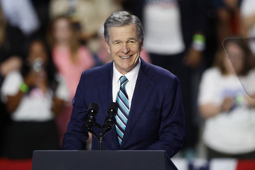 FILE - North Carolina Gov. Roy Cooper speaks at a campaign event in Charlotte