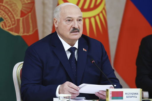 Belarusian President Alexander Lukashenko attends a meeting of the Supreme Eurasian Economic Council on the sidelines of the Eurasian Economic Forum in Minsk