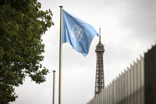 The UNESCO flag flies at its headquarters Tuesday