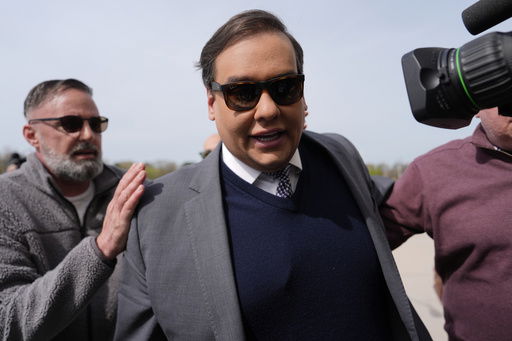 FILE - Former U.S. Rep. George Santos arrives at federal court for sentencing