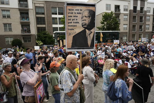 People take part in the annual Rep. John Lewis Way March