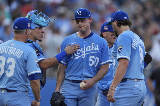 Kansas City Royals starting pitcher Kris Bubic (50) comes out of the game during the third inning in the second baseball game of a doubleheader against the Cleveland Guardians