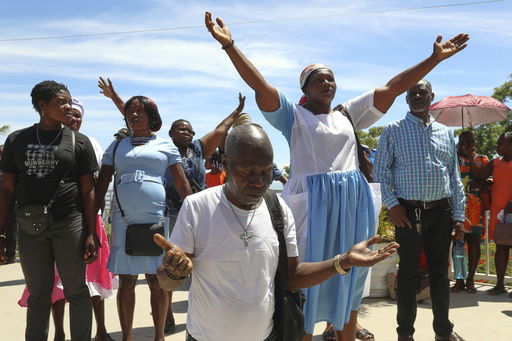 Pilgrims attend a Mass celebrating the Feast of Our Lady of Mount Carmel at the namesake church in the Pétion-Ville neighborhood of Port-au-Prince
