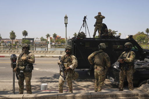 Federal agents stage at MacArthur Park Monday