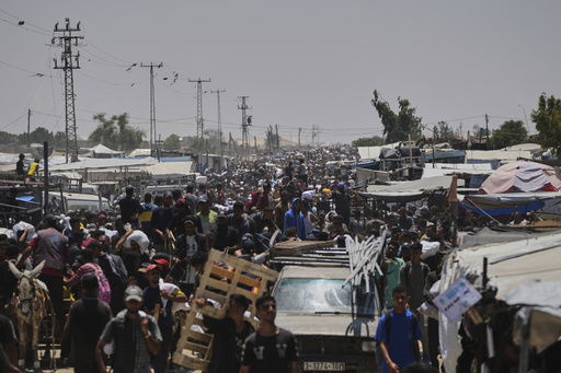 Palestinians heading to receive food and humanitarian aid packages from the Gaza Humanitarian Foundation