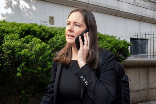 FILE - Assistant U.S. Attorney Maurene Comey is outside court during the Sean