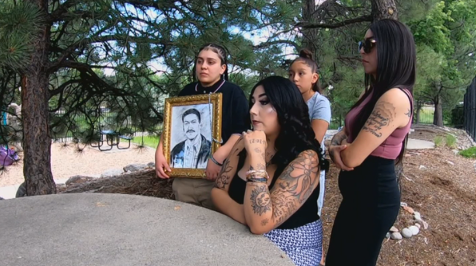 <i>KCNC via CNN Newsource</i><br/>The family of Baldomero Noa-Castaneda holds up a portrait of the 67-year-old father of five while talking about his decades in Colorado and his arrest by ICE early June.