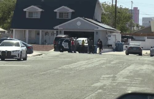 as Vegas Metro Police are investigating the death of a 20-year-old man whose body was discovered in a backyard swimming pool.