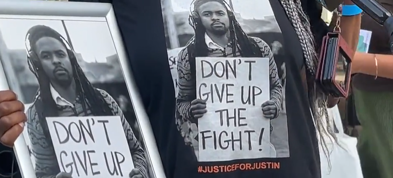 <i>KYW via CNN Newsource</i><br/>Families who lost loved ones to gun violence held pictures close to their hearts and marched together as one near the Wilson Park Pavilion on Jackson Street in South Philadelphia on July 28.