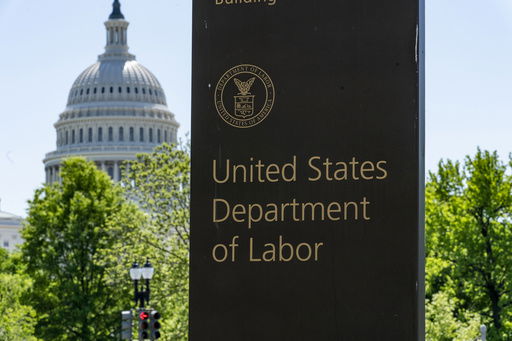 FILE - The entrance to the Labor Department is seen near the Capitol in Washington