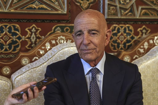 U.S. Ambassador to Turkey and Special Envoy to Syria Tom Barrack speaks during an interview with The Associated Press at the airport in Damascus