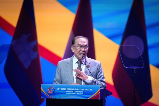 Malaysia's Prime Minister Anwar Ibrahim delivers his keynote address during the opening ceremony of the Association of Southeast Asian Nations (ASEAN) Foreign Ministers' meeting and related meetings at the Convention Centre in Kuala Lumpur