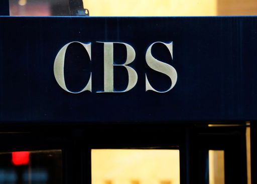 FILE - The CBS logo at the entrance to its headquarters