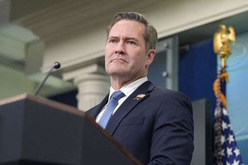 FILE - White House National Security Adviser Mike Waltz listens to a question from a reporter in the James Brady Press Briefing Room at the White House in Washington