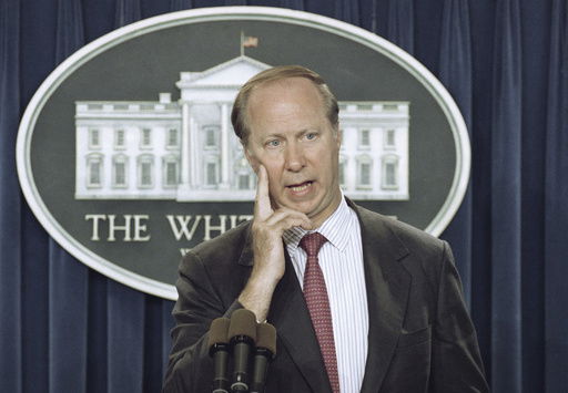 FILE - David Gergen answers a reporter's question in the briefing room of the White House in Washington on June 7