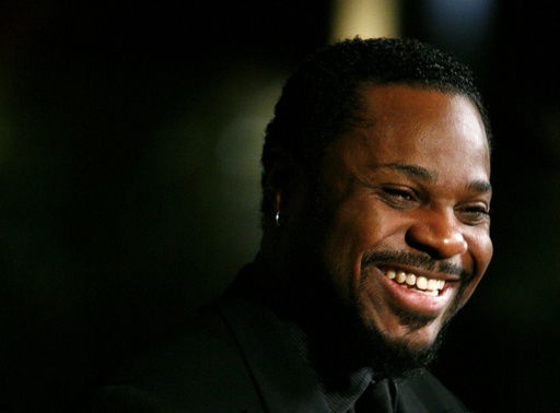 FILE - Actor Malcolm-Jamal Warner is seen on the red carpet of the Mark Twain Prize for American Humor