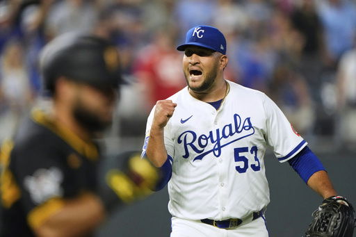 Kansas City Royals relief pitcher Carlos Estevez celebrates after a baseball game against the Pittsburgh Pirates
