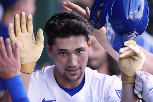 Kansas City Royals' Jac Caglianone celebrates in the dugout after hitting a solo home run during the second inning of a baseball game against the Pittsburgh Pirates