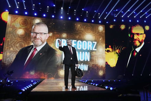 FILE - Confederation candidate Grzegorz Braun appears at a convention in Katowice