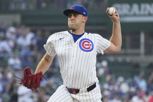 Chicago Cubs starting pitcher Matthew Boyd throws against the Kansas City Royals during the first inning of a baseball game in Chicago