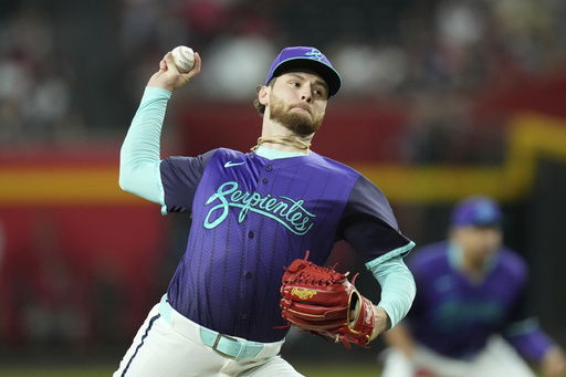 Arizona Diamondbacks starting pitcher Ryne Nelson throws against the Kansas City Royals during the first inning of a baseball game Saturday
