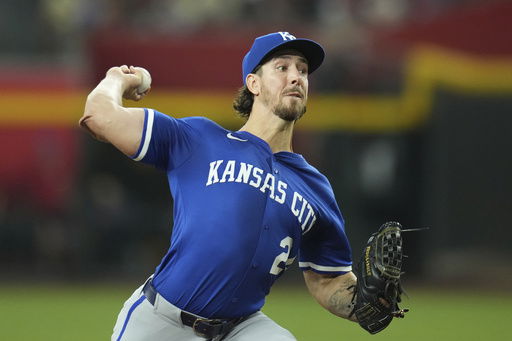 Kansas City Royals starting pitcher Michael Lorenzen throws against the Arizona Diamondbacks during the first inning of a baseball game Sunday